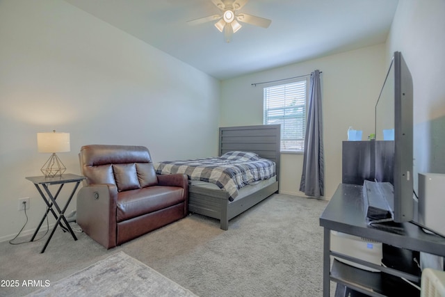 bedroom with baseboards, a ceiling fan, and carpet