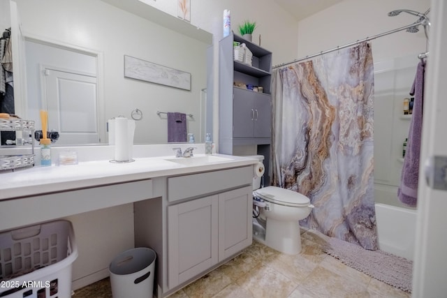 bathroom featuring toilet, shower / tub combo with curtain, and vanity