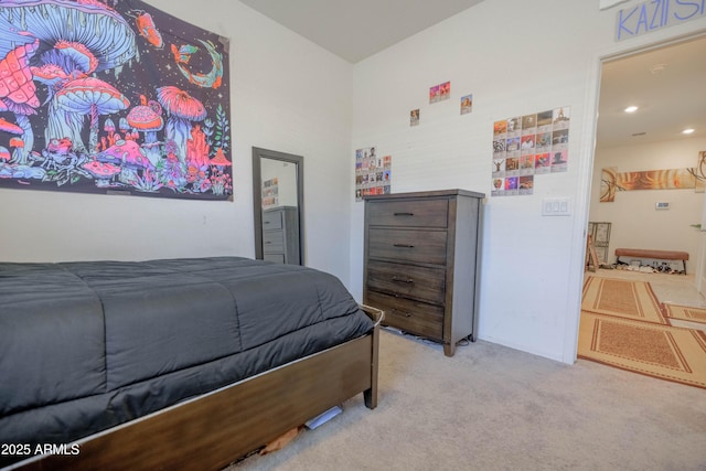 carpeted bedroom with recessed lighting