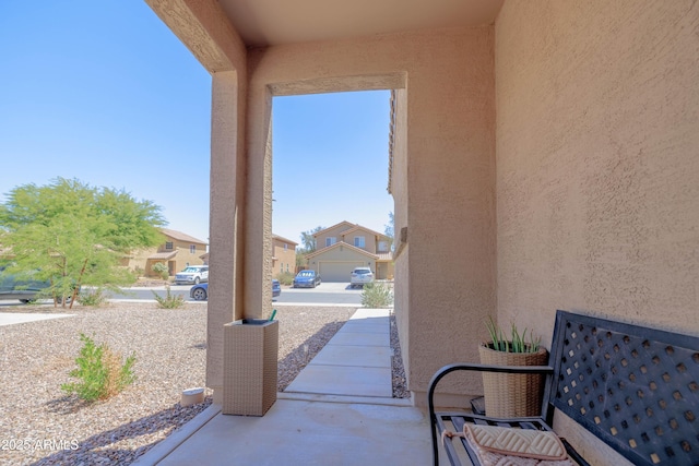 view of patio with a residential view