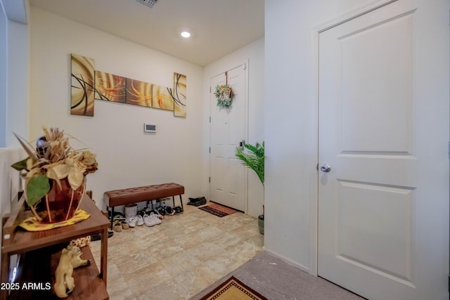 entryway with recessed lighting