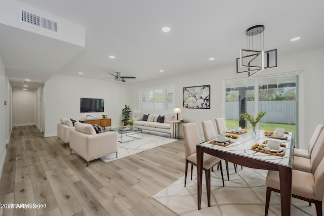 8955 W Monterey Way, Phoenix, AZ 85037 - living area featuring light wood finished floors and recessed lighting