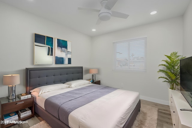 8955 W Monterey Way, Phoenix, AZ 85037 - bedroom featuring wood finished floors, recessed lighting, baseboards, and a ceiling fan