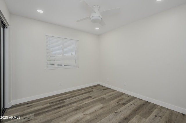 8955 W Monterey Way, Phoenix, AZ 85037 - unfurnished room with wood finished floors, baseboards, recessed lighting, and ceiling fan