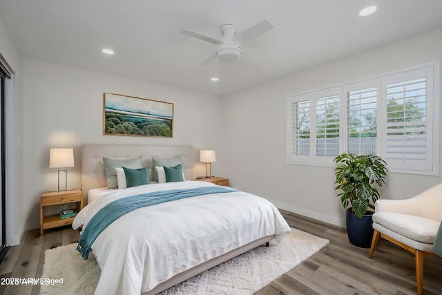 8955 W Monterey Way, Phoenix, AZ 85037 - bedroom featuring wood finished floors, recessed lighting, baseboards, and ceiling fan