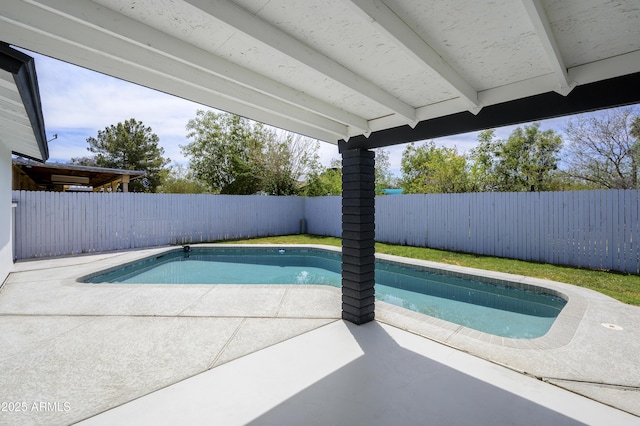 8955 W Monterey Way, Phoenix, AZ 85037 - view of swimming pool featuring a fenced backyard and a patio area