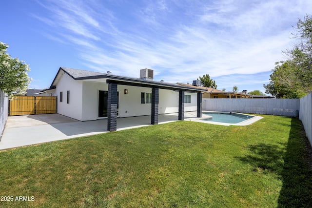 8955 W Monterey Way, Phoenix, AZ 85037 - rear view of house with stucco siding, a patio area, and central AC unit