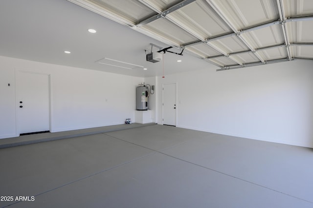 8955 W Monterey Way, Phoenix, AZ 85037 - garage featuring electric water heater, a garage door opener, and recessed lighting