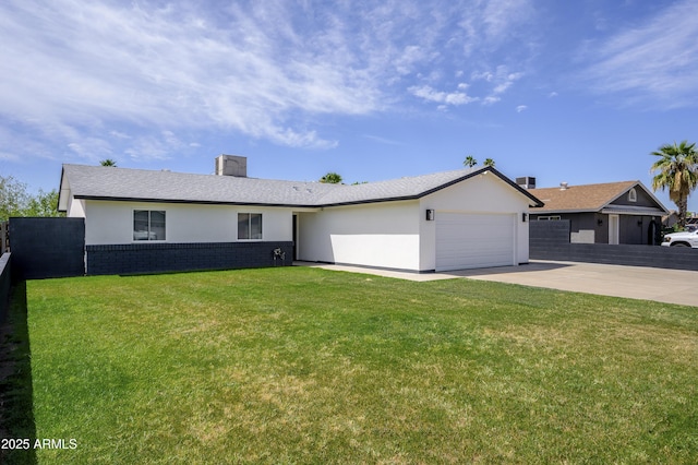 8955 W Monterey Way, Phoenix, AZ 85037 - ranch-style house featuring an attached garage, concrete driveway, stucco siding, and a chimney