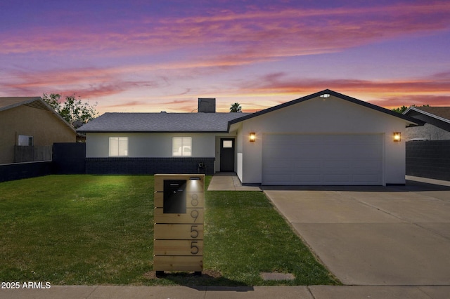8955 W Monterey Way, Phoenix, AZ 85037 - ranch-style home featuring driveway, a garage, and stucco siding