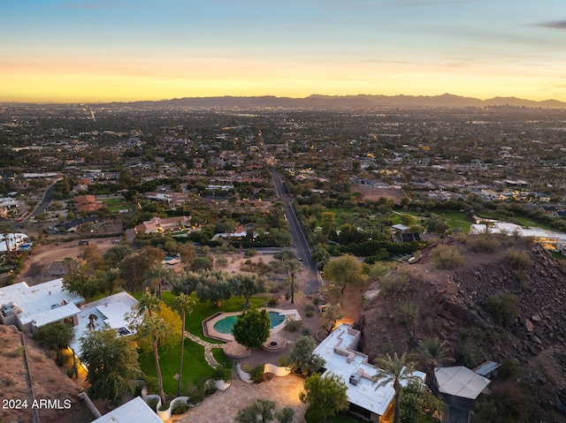 aerial view at dusk with a mountain view