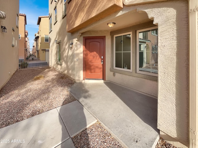 doorway to property featuring a patio