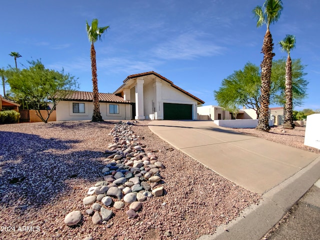 view of front of property featuring a garage