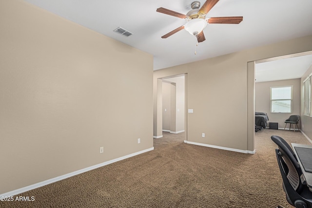1915 S Ponderosa Dr, Gilbert, AZ 85295 - office space with ceiling fan, carpet, and baseboards