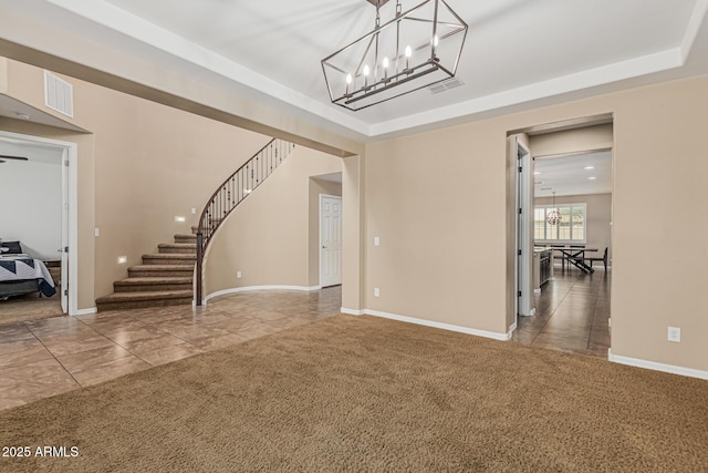 1915 S Ponderosa Dr, Gilbert, AZ 85295 - unfurnished living room featuring a chandelier, carpet floors, stairway, a raised ceiling, and baseboards