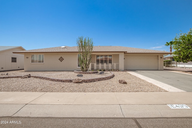 single story home with a garage