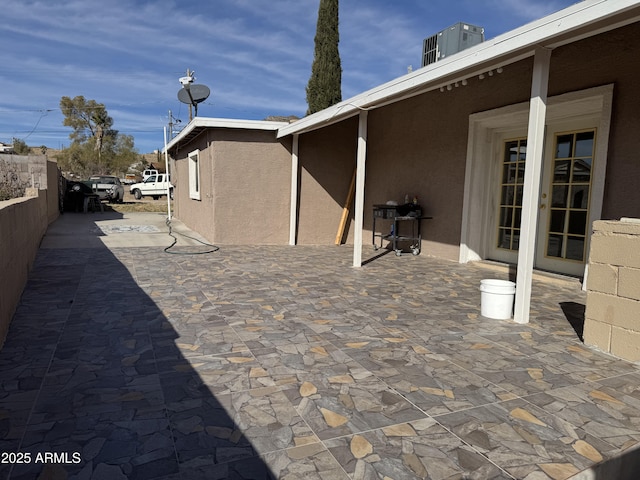 view of patio featuring cooling unit