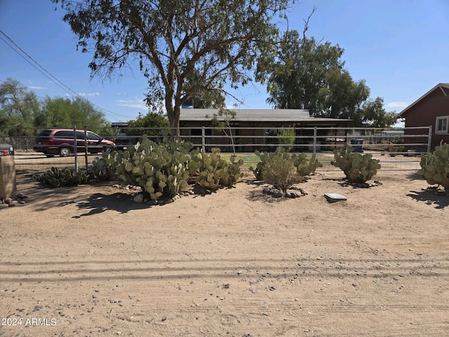 view of yard featuring an exterior structure and an outdoor structure