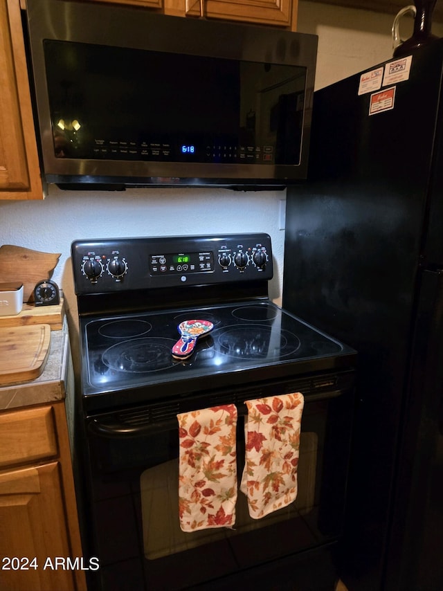 kitchen with black appliances