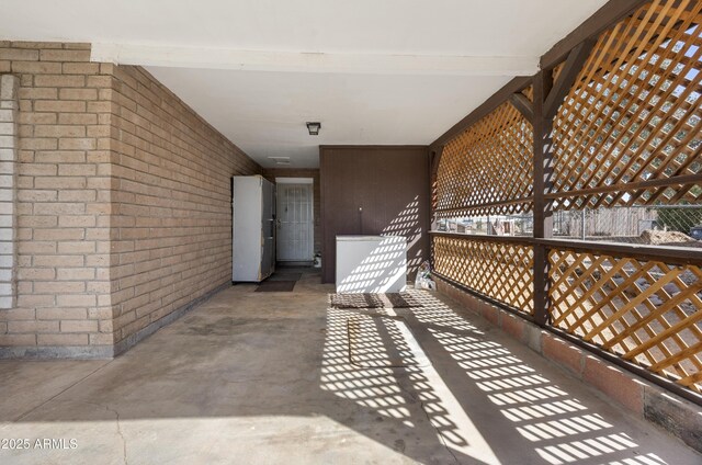 doorway to outside featuring tile patterned floors