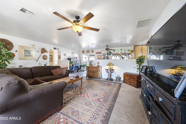 carpeted living room with visible vents