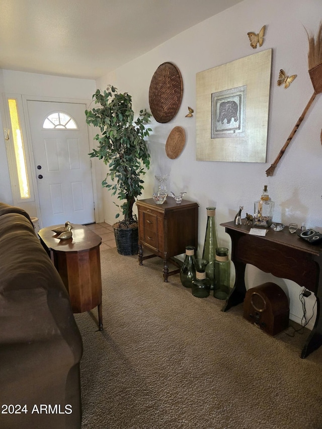 foyer featuring carpet flooring