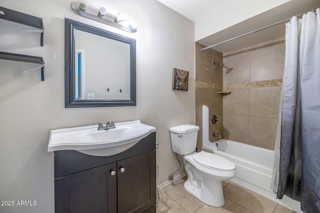 full bathroom with tile patterned flooring, shower / tub combo with curtain, vanity, toilet, and baseboards