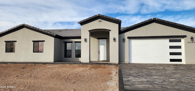 view of front of home featuring a garage