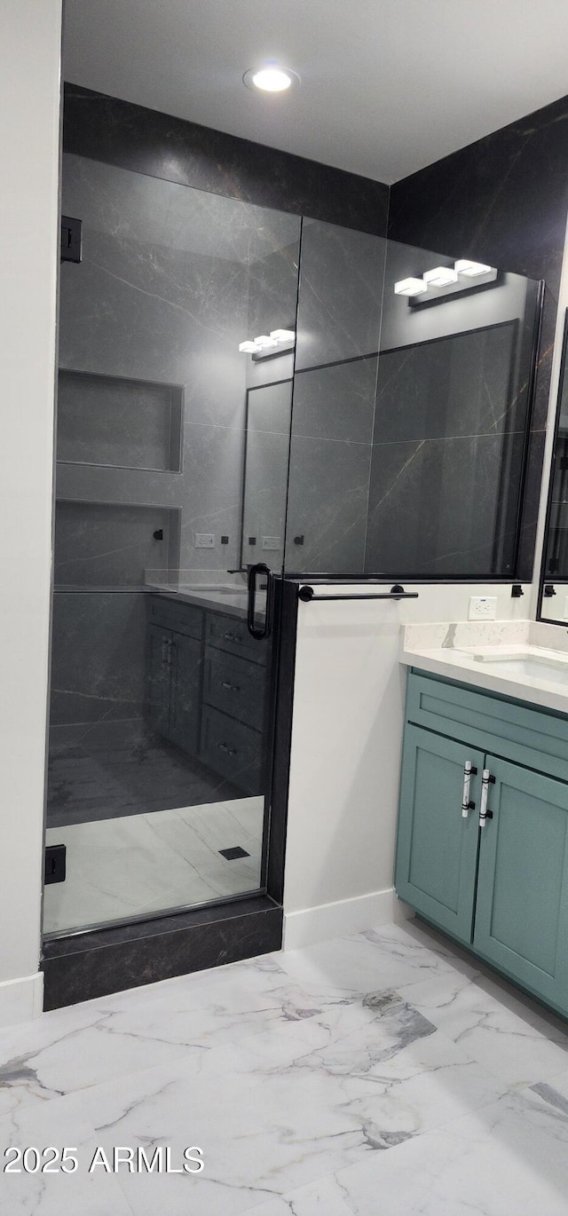 bathroom featuring vanity and walk in shower