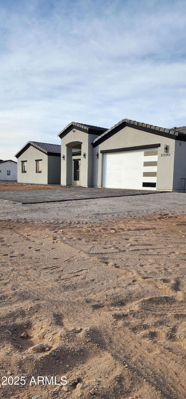 view of front of home featuring a garage