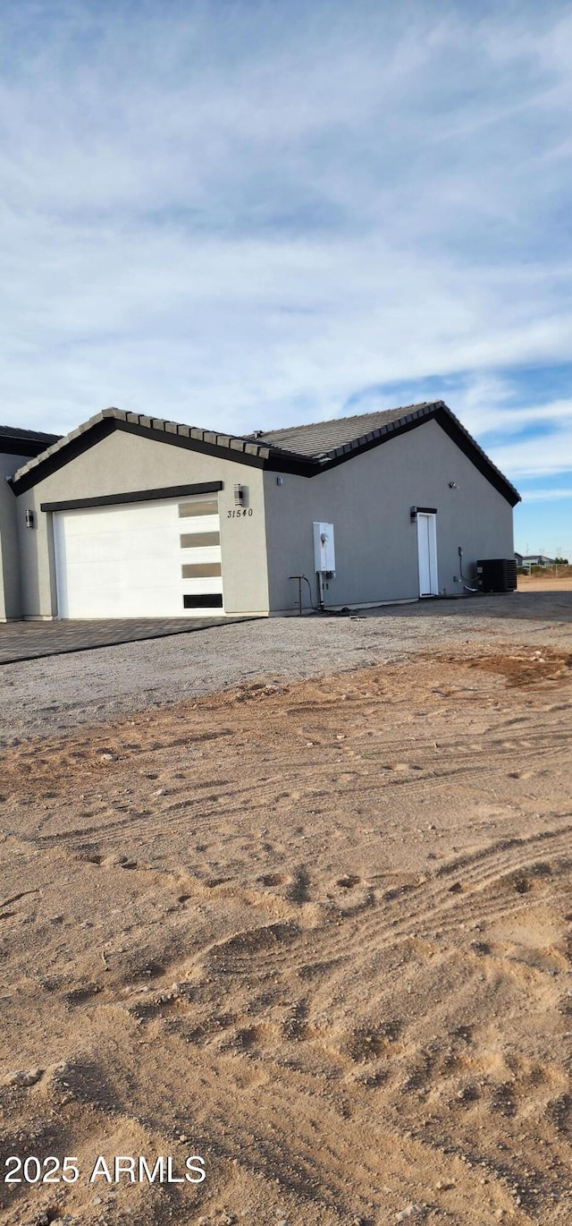 view of front of property featuring a garage