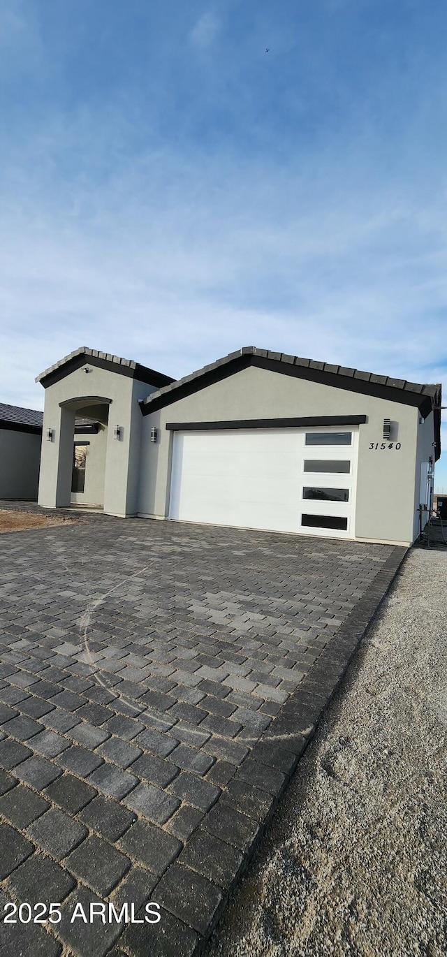 view of front of home featuring a garage