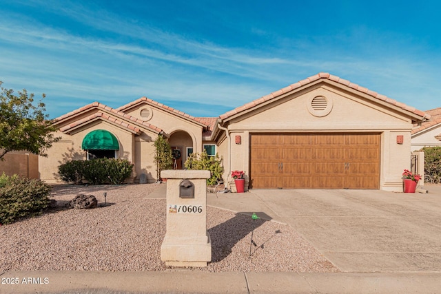 view of front of home with a garage