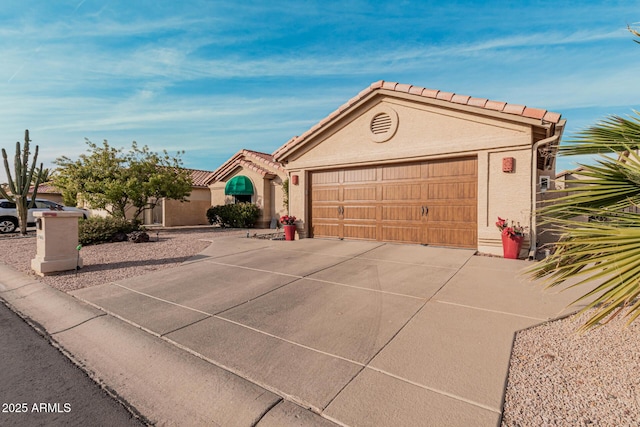 view of front of home with a garage