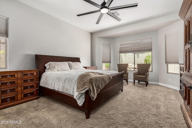 3824 E Parkside Ln, Phoenix, AZ 85050 - bedroom with light colored carpet, baseboards, and ceiling fan
