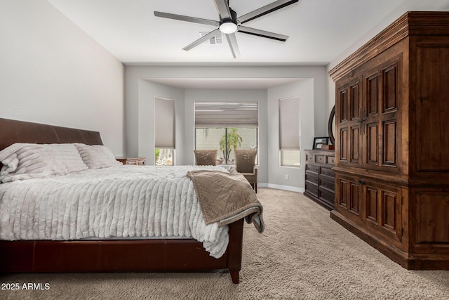 3824 E Parkside Ln, Phoenix, AZ 85050 - bedroom featuring light colored carpet, baseboards, and a ceiling fan