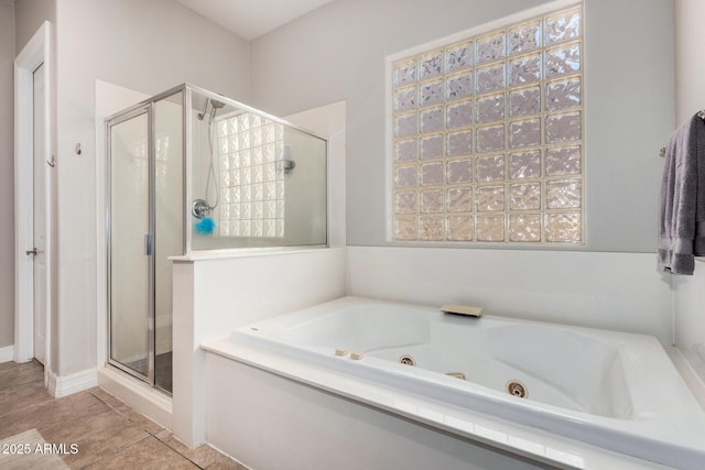 3824 E Parkside Ln, Phoenix, AZ 85050 - bathroom featuring a stall shower, a tub with jets, and tile patterned floors