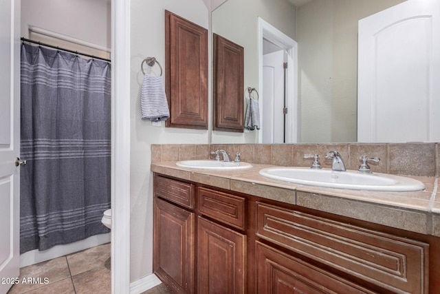3824 E Parkside Ln, Phoenix, AZ 85050 - full bathroom featuring double vanity, toilet, a shower with shower curtain, and tile patterned flooring