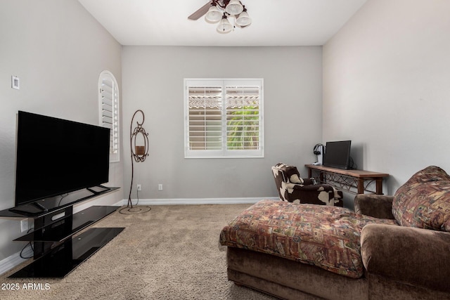 3824 E Parkside Ln, Phoenix, AZ 85050 - carpeted living area with ceiling fan and baseboards