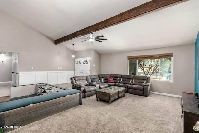 living room with vaulted ceiling with beams, light carpet, and ceiling fan