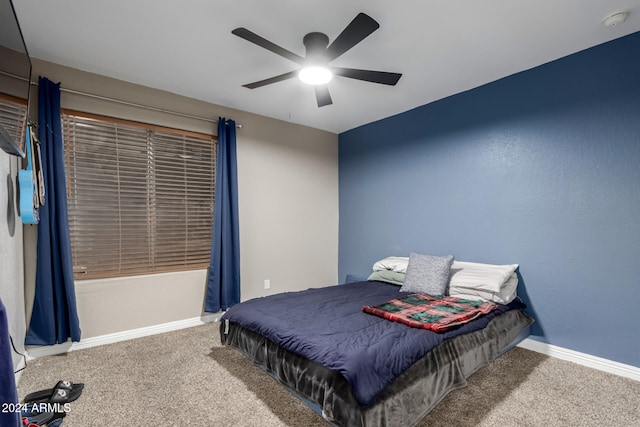 bedroom featuring carpet and ceiling fan