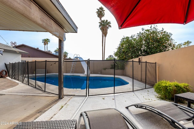 view of pool featuring a patio area