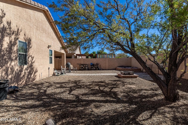 view of yard with a patio area and a fenced backyard