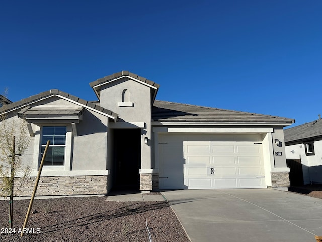 view of front of home featuring a garage