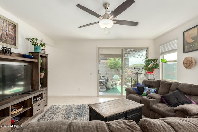 4269 W Coneflower Ln, San Tan Valley, AZ 85144 - living area with light tile patterned floors, baseboards, and a ceiling fan