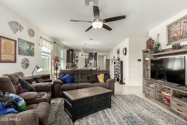 4269 W Coneflower Ln, San Tan Valley, AZ 85144 - living area with light tile patterned floors, a ceiling fan, and visible vents