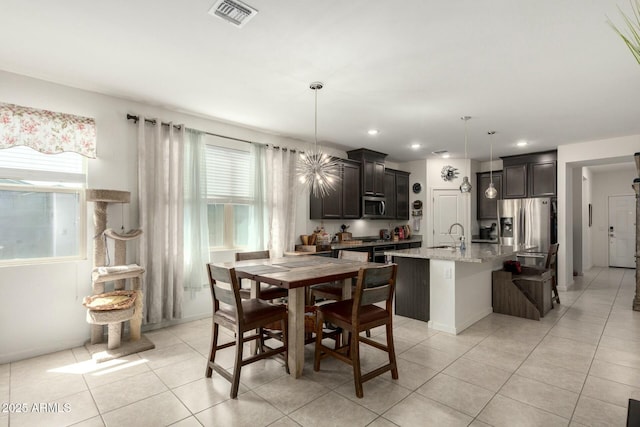 4269 W Coneflower Ln, San Tan Valley, AZ 85144 - dining room featuring recessed lighting, light tile patterned floors, and visible vents