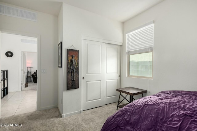 4269 W Coneflower Ln, San Tan Valley, AZ 85144 - carpeted bedroom with visible vents, a closet, and baseboards