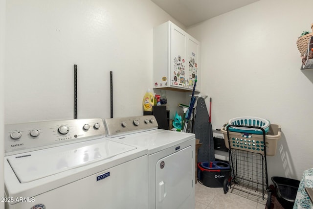 4269 W Coneflower Ln, San Tan Valley, AZ 85144 - clothes washing area featuring cabinet space, light tile patterned floors, and separate washer and dryer