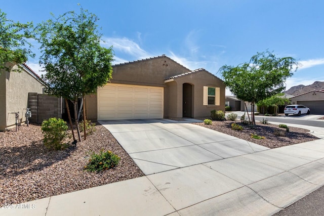 4269 W Coneflower Ln, San Tan Valley, AZ 85144 - ranch-style house with stucco siding, fence, a tile roof, an attached garage, and concrete driveway
